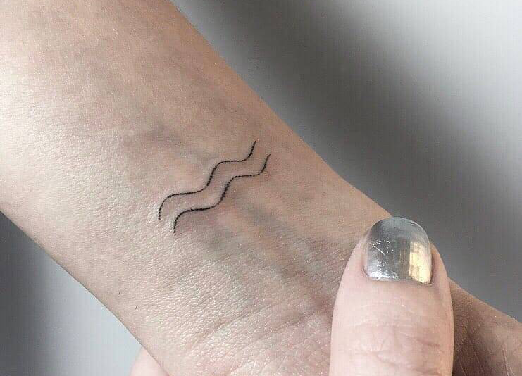 pisces stick and poke tattoo
