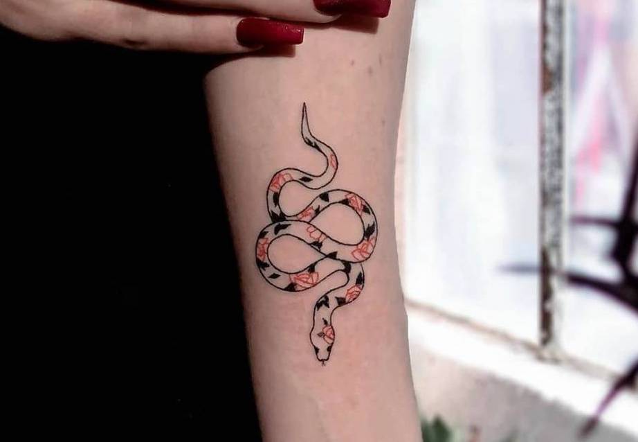 stick and poke tattoo snake